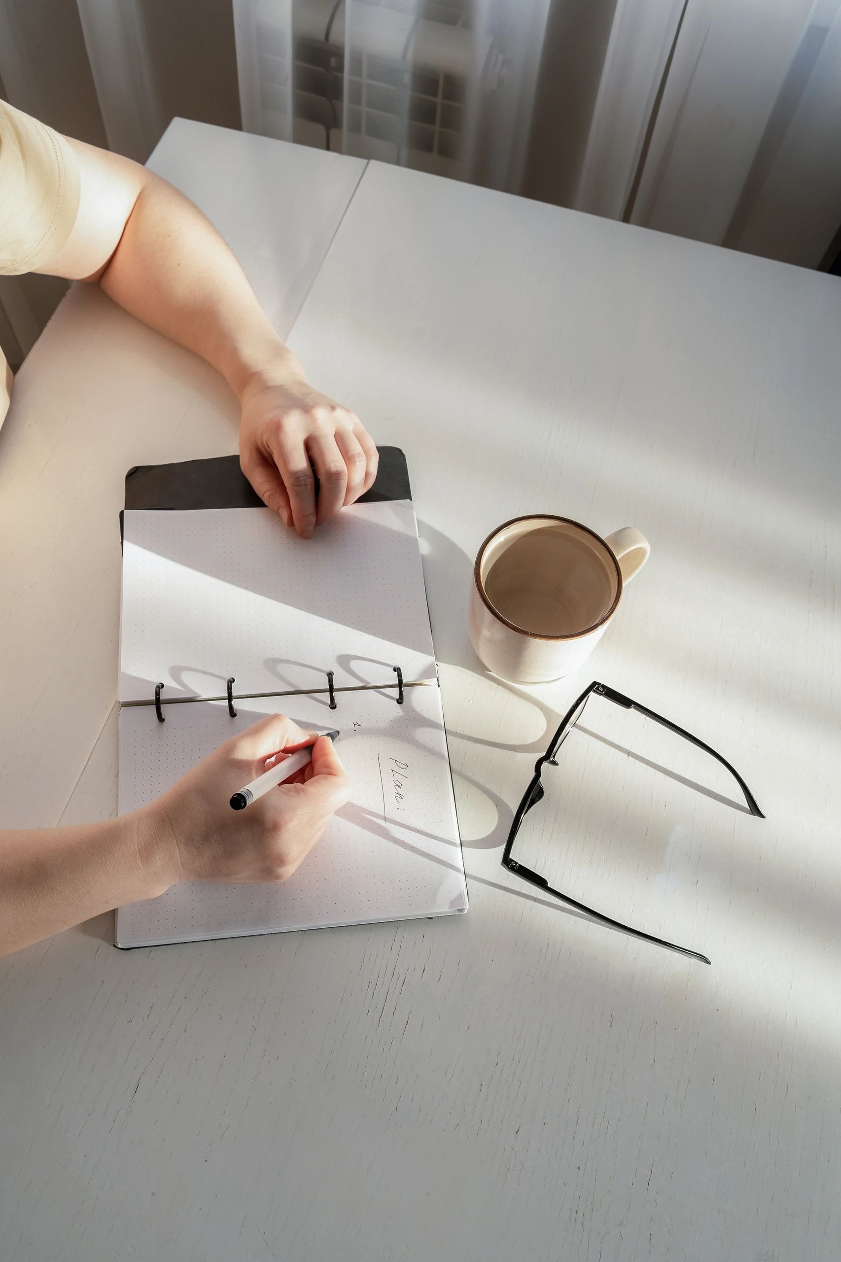 Mindful workspace — notebook and coffee
